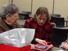 More members trying out iPads together.